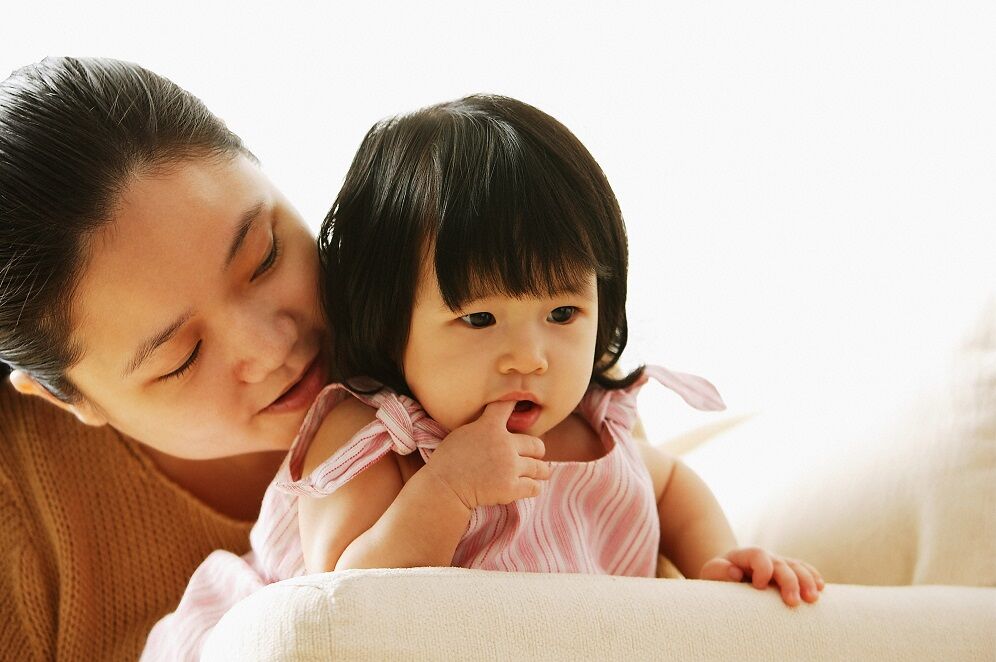 Fussy baby chewing cheap on hands